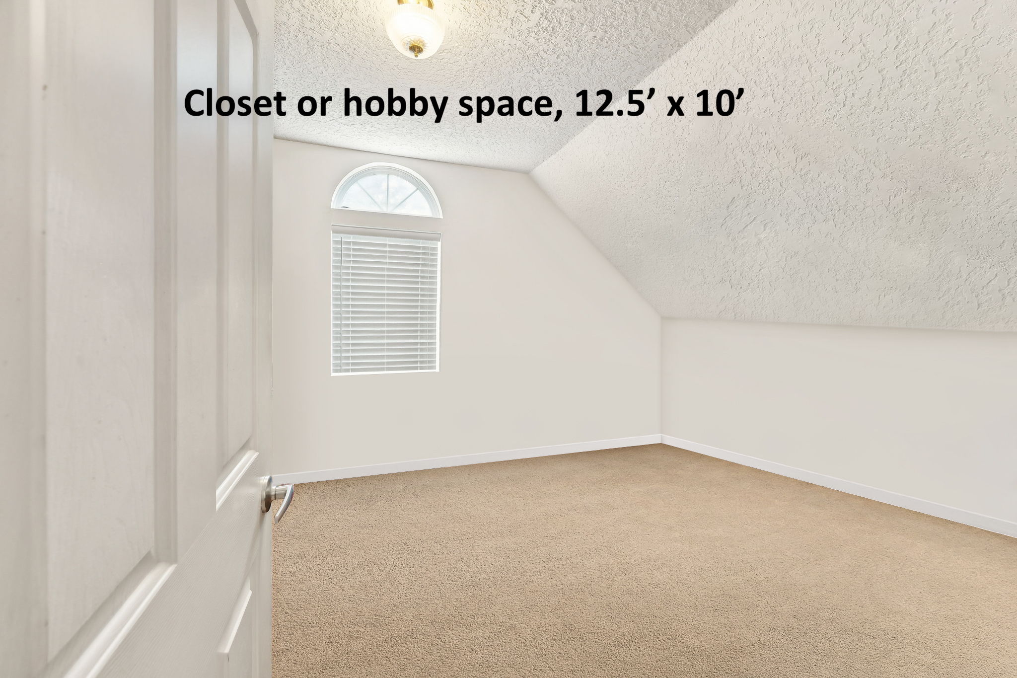 ... along with a large adjoining storage room that can serve as a closet or hobby space.