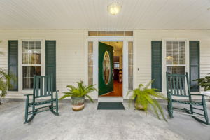Enjoy a broad, welcoming front porch designed for shade and outdoor living