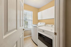 ... laundry room and easy garage access.