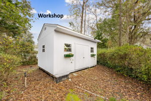 The property includes a workshop outbuilding ...
