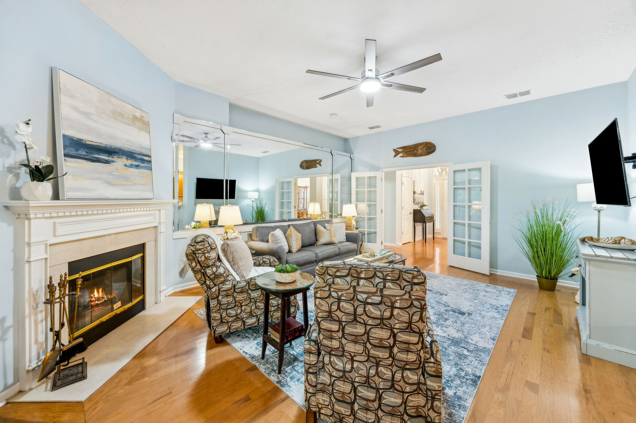 ... while a gas fireplace creates a warm, inviting focal point.