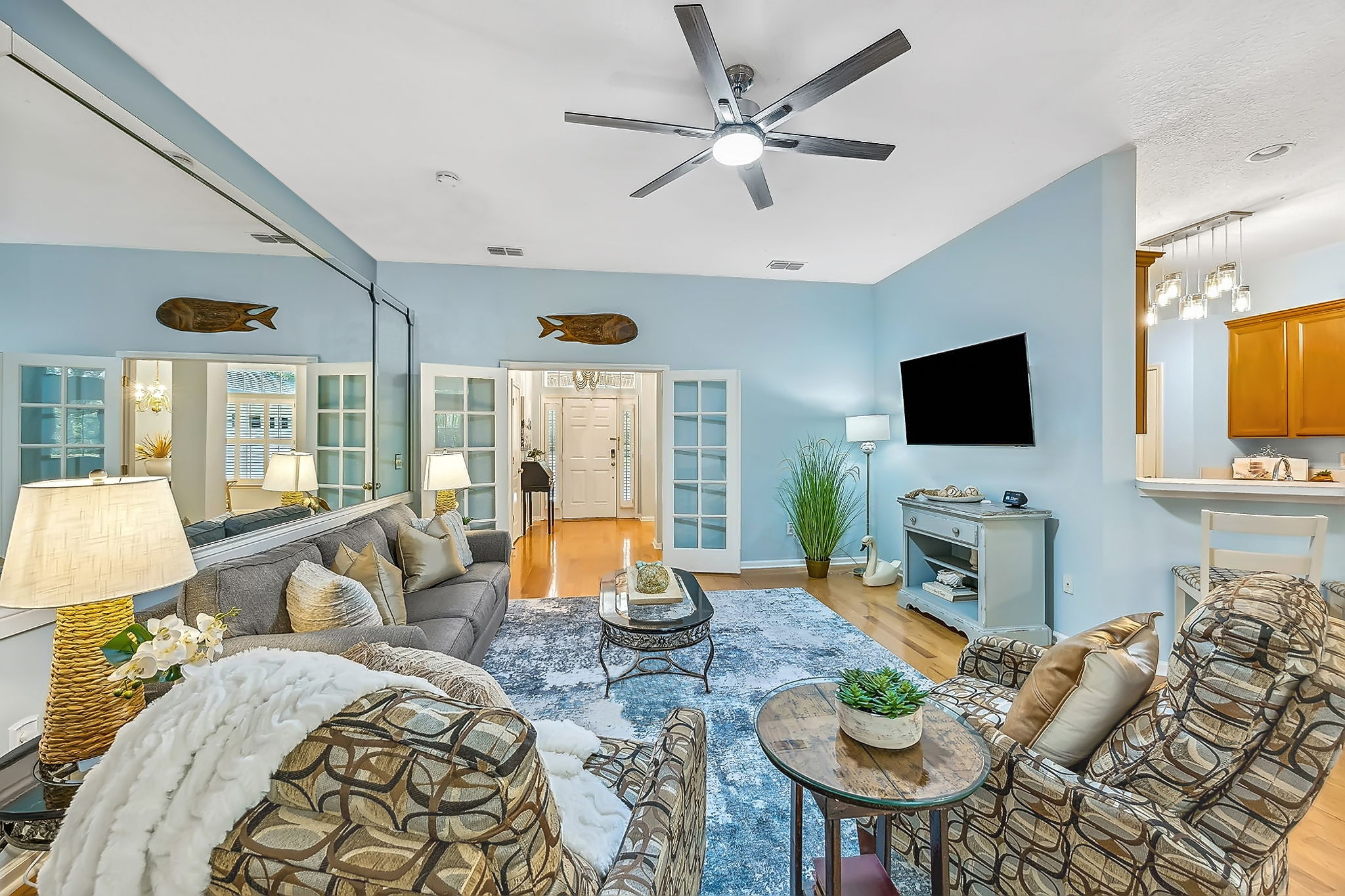 Don’t love the mirrored wall? It’s an easy one-day, $750 handyman update.