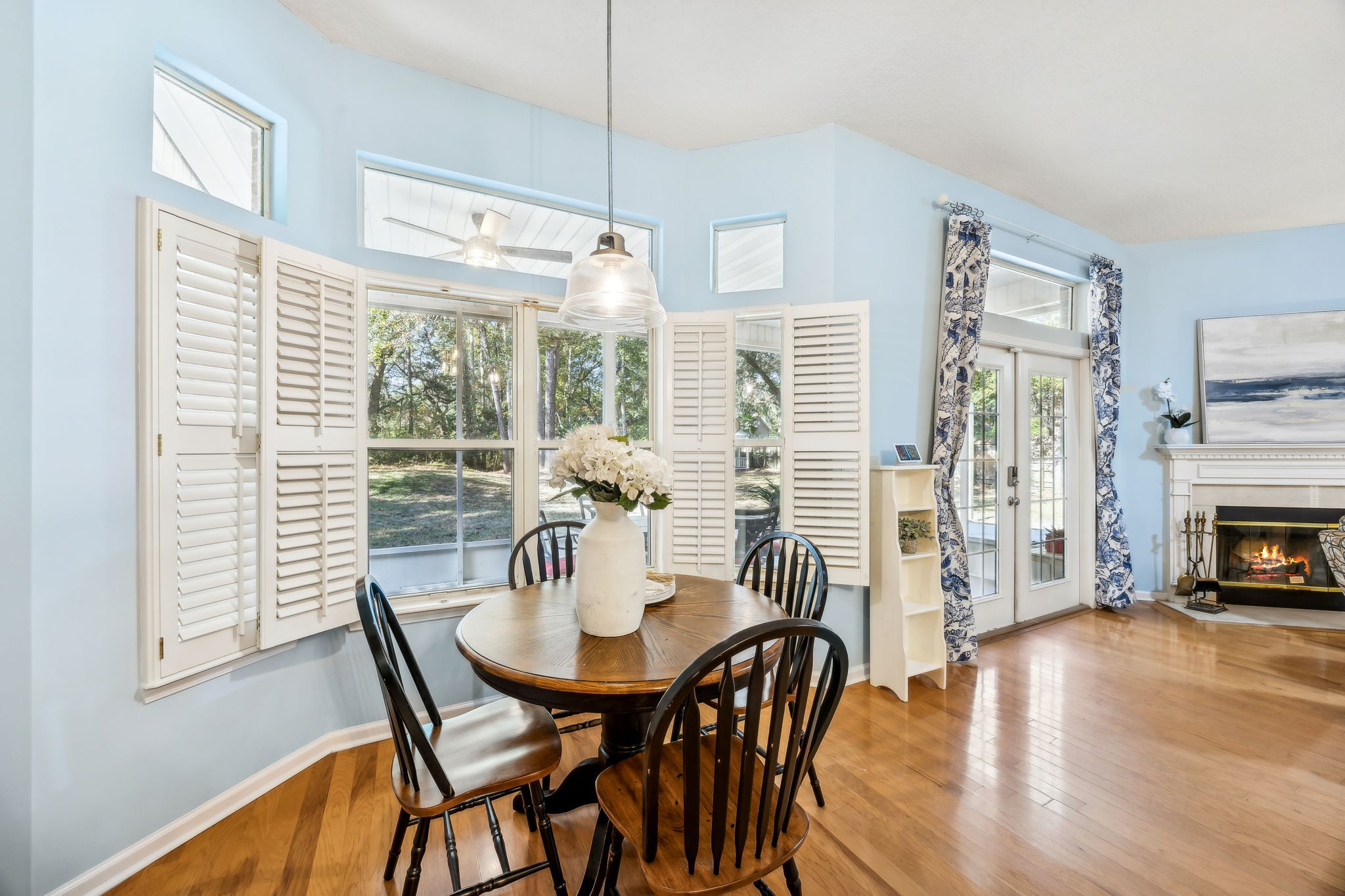 The family room opens to a cheerful breakfast nook ...