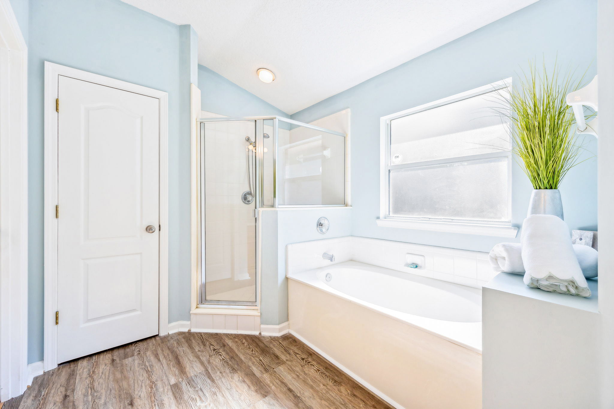 ... with walk-in shower and garden tub.