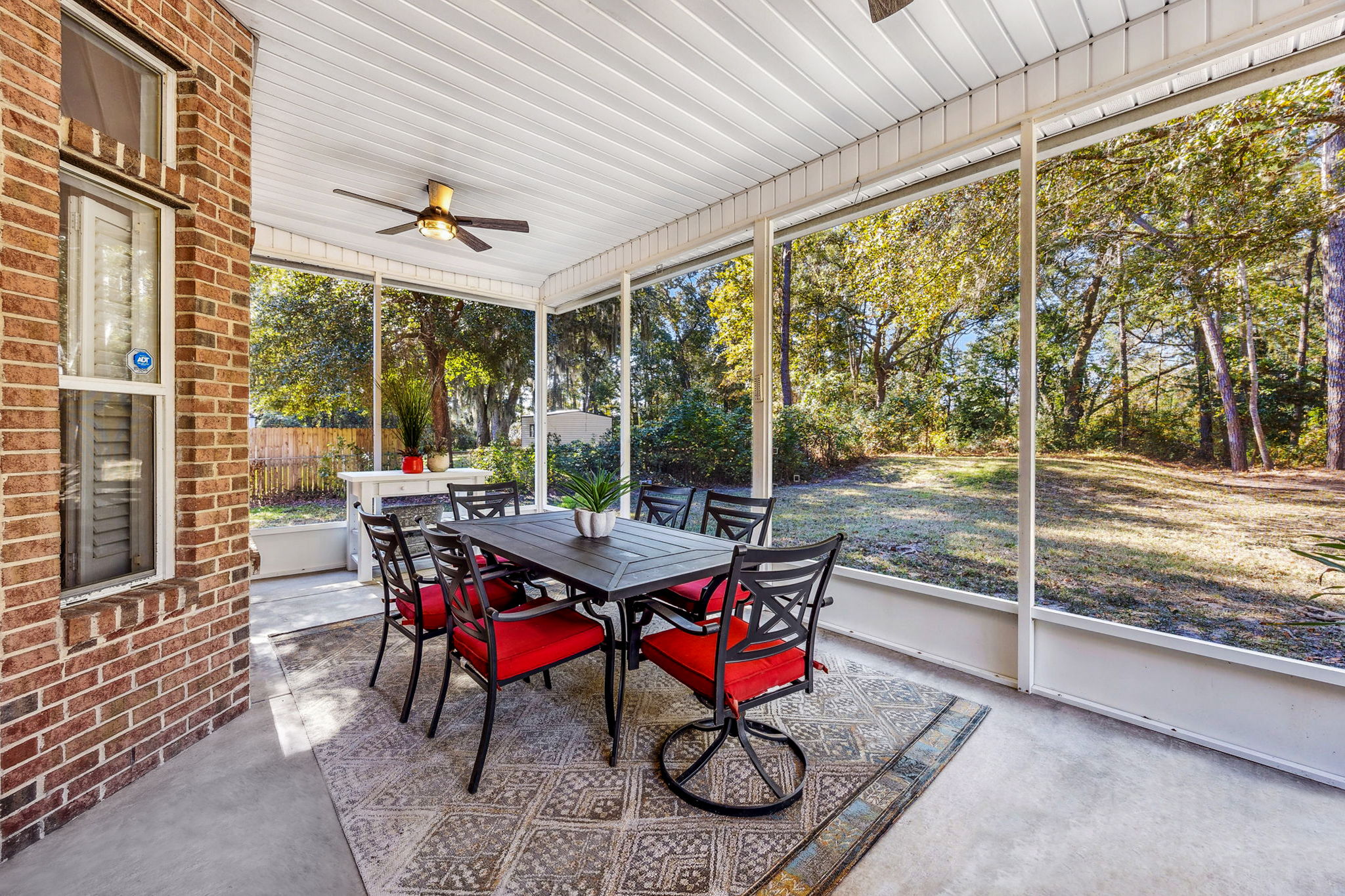 ... that gazes out upon the peaceful, wooded grounds.