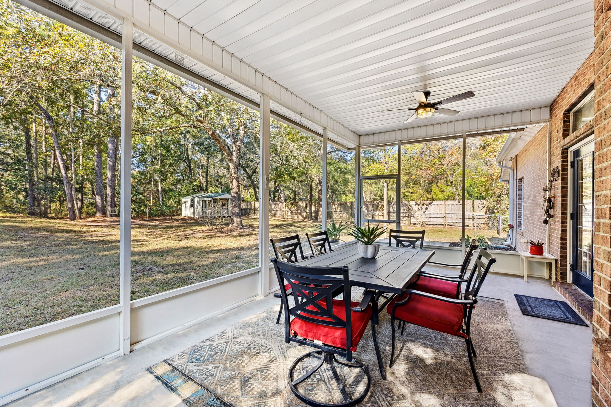 The fully fenced backyard offers exceptional privacy ...