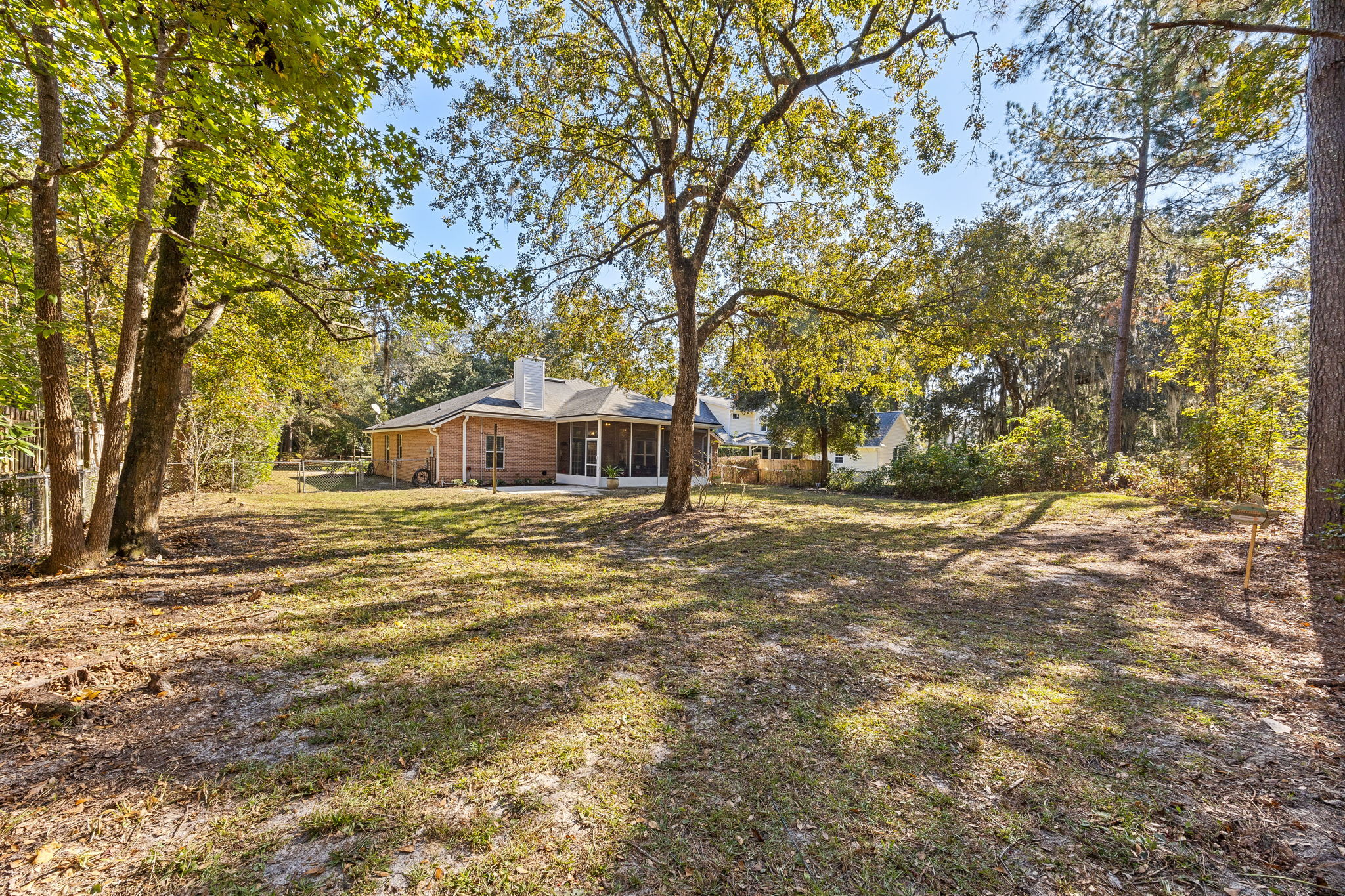 The high and dry lot is accented by stately trees, some fruit producing ...