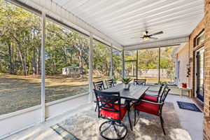 The fully fenced backyard offers exceptional privacy ...