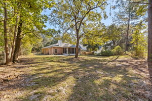 The high and dry lot is accented by stately trees, some fruit producing ...