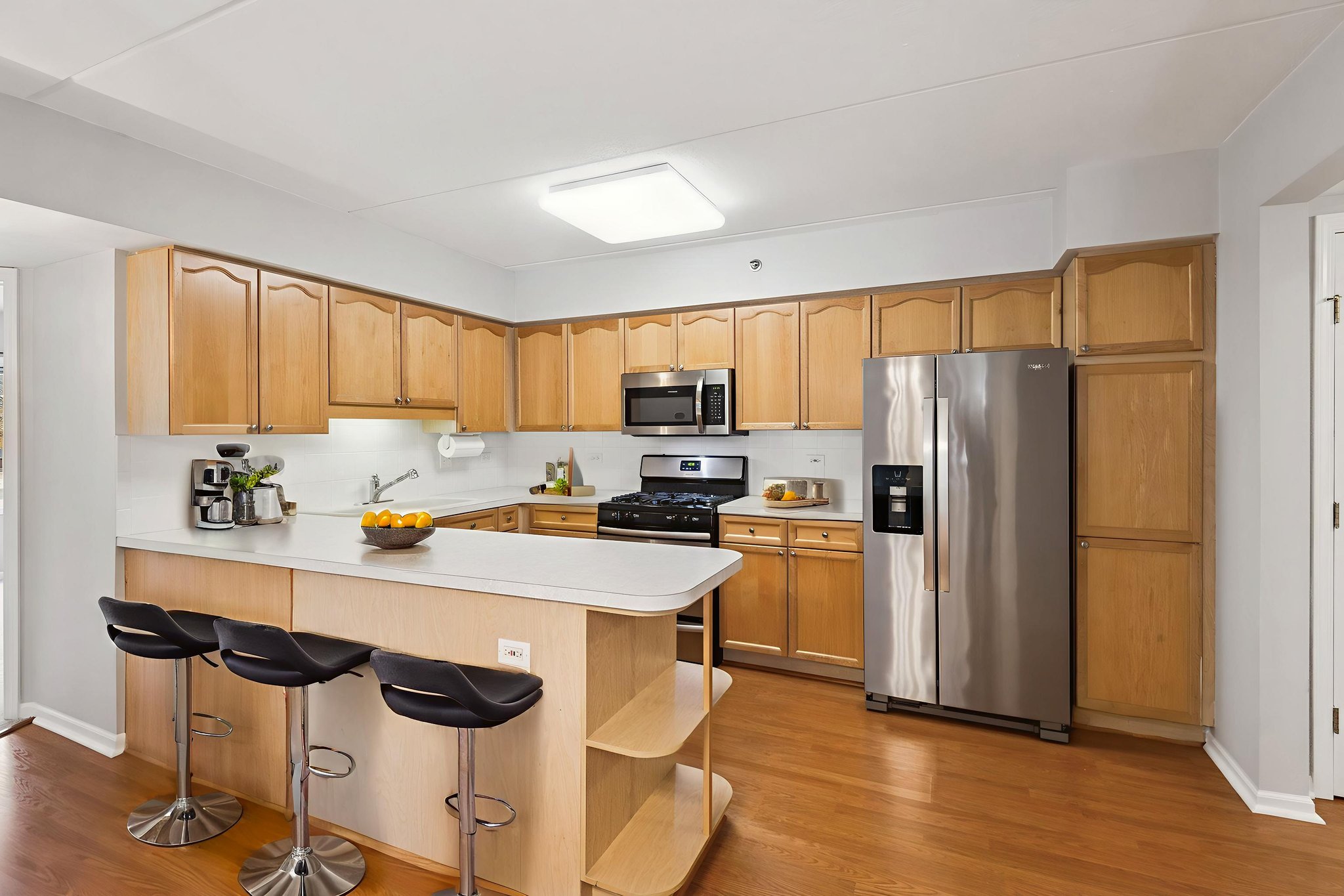 8650 Shermer Rd 102_005 virtually staged.jpeg