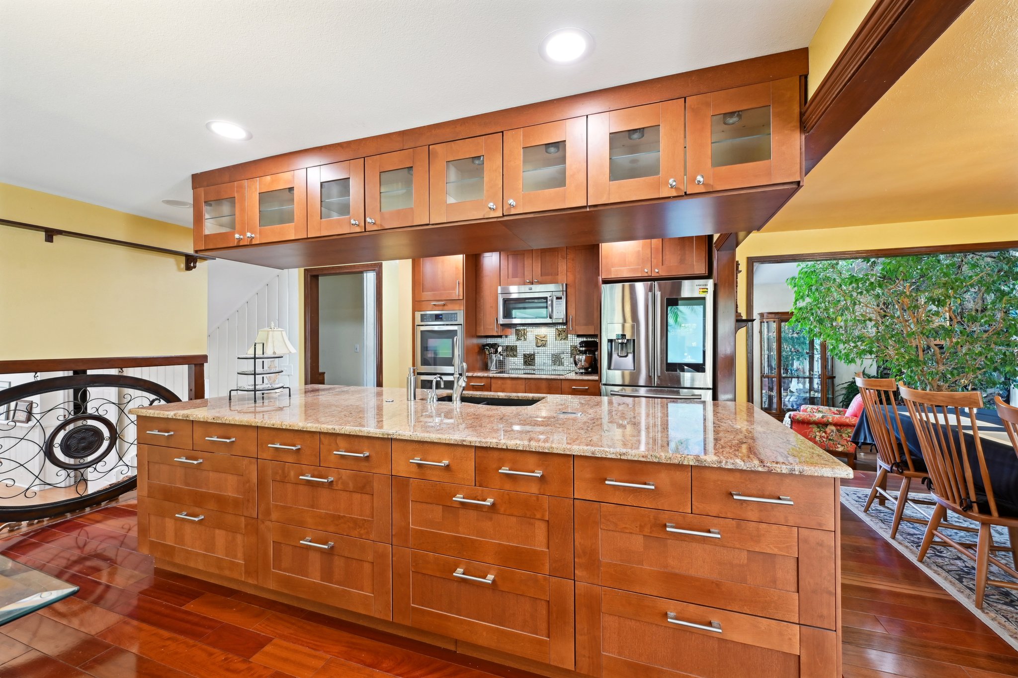 Fabulous center island with lighted cabinetry above.