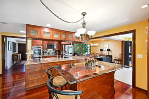 Renovated kitchen functions as the the heart of the home!