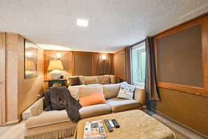 Theater room has egress window and can be converted to a bedroom!