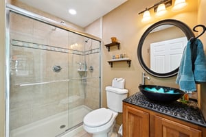 Main floor full bathroom off sunroom.