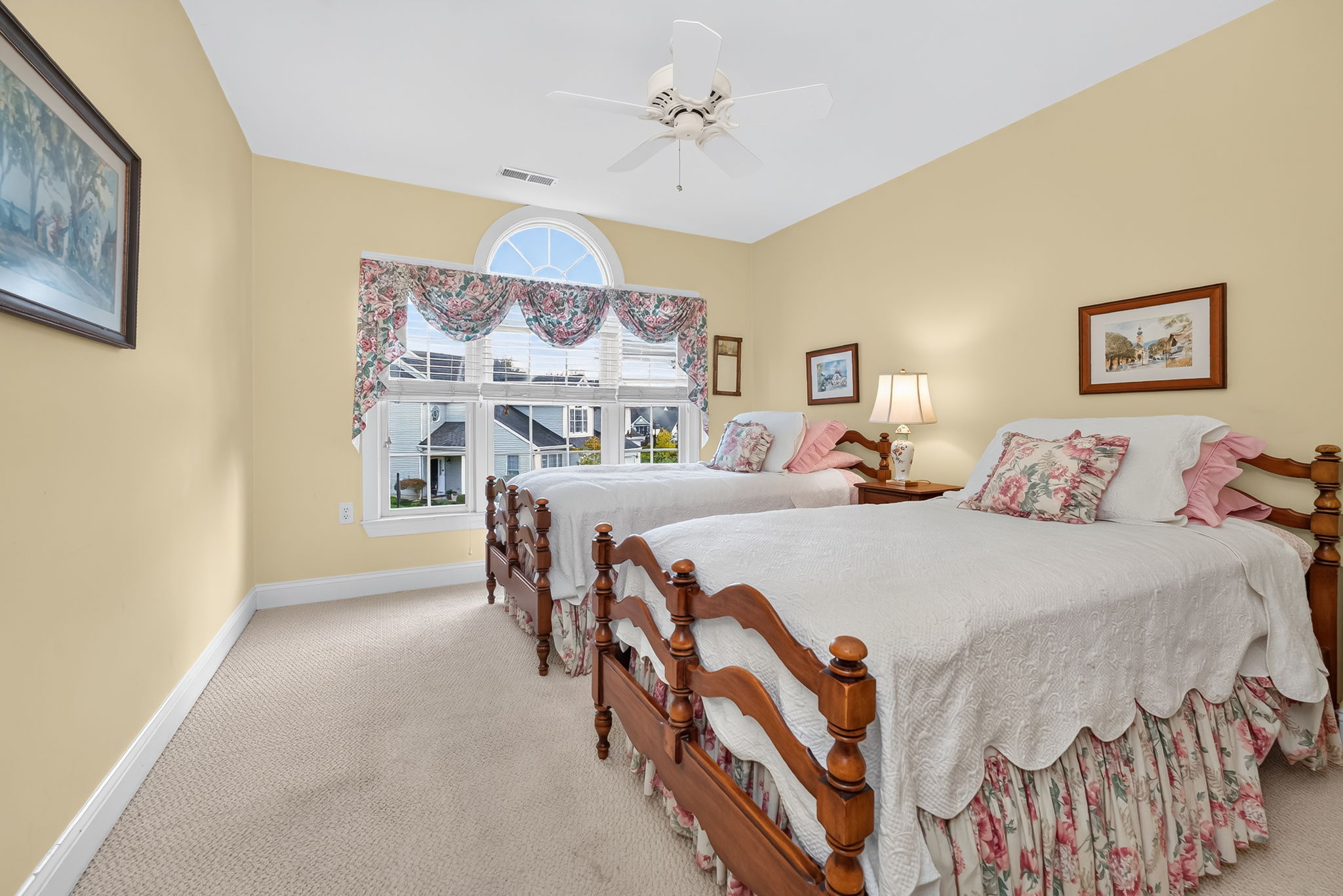 BEDROOM 3 Ceiling fan, double slider closet, and carpeting