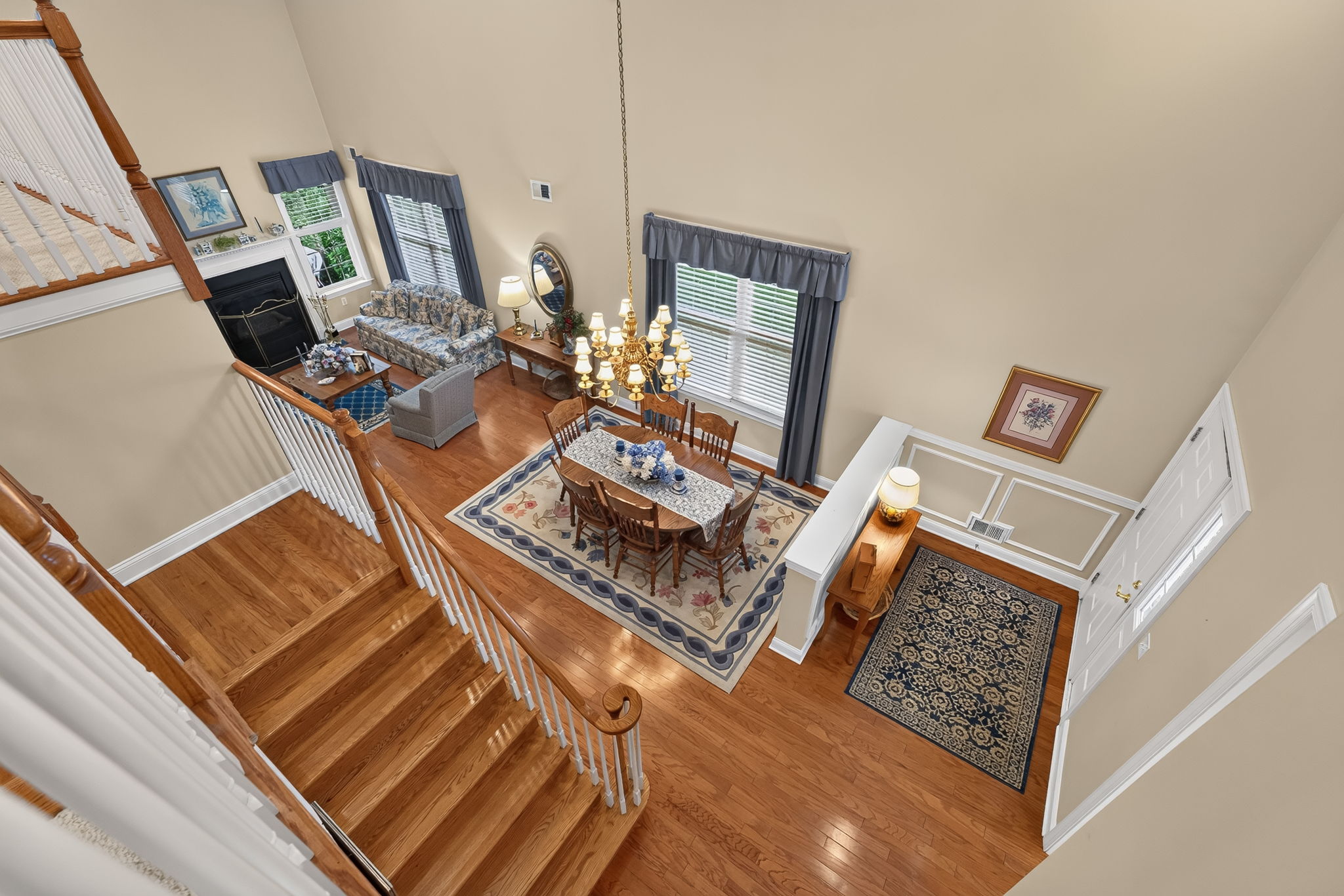 LOFT A turned staircase leads to the expansive loft overlooking the living and dining rooms.