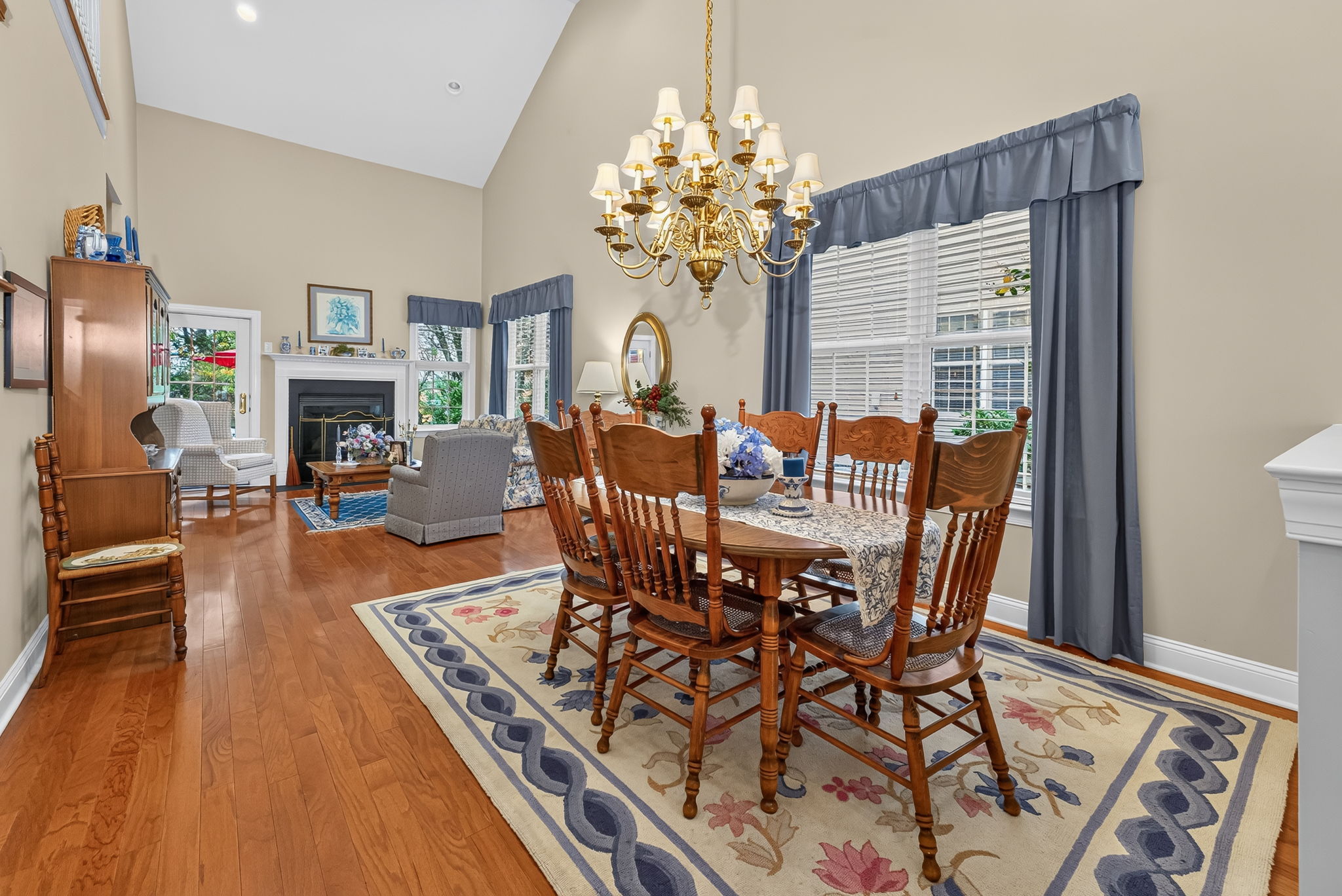 :	TWO STORY DINING ROOM The open-concept living and dining rooms are ideal for entertaining,