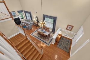 LOFT A turned staircase leads to the expansive loft overlooking the living and dining rooms.