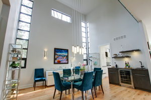 2 story Dining Room with wet bar