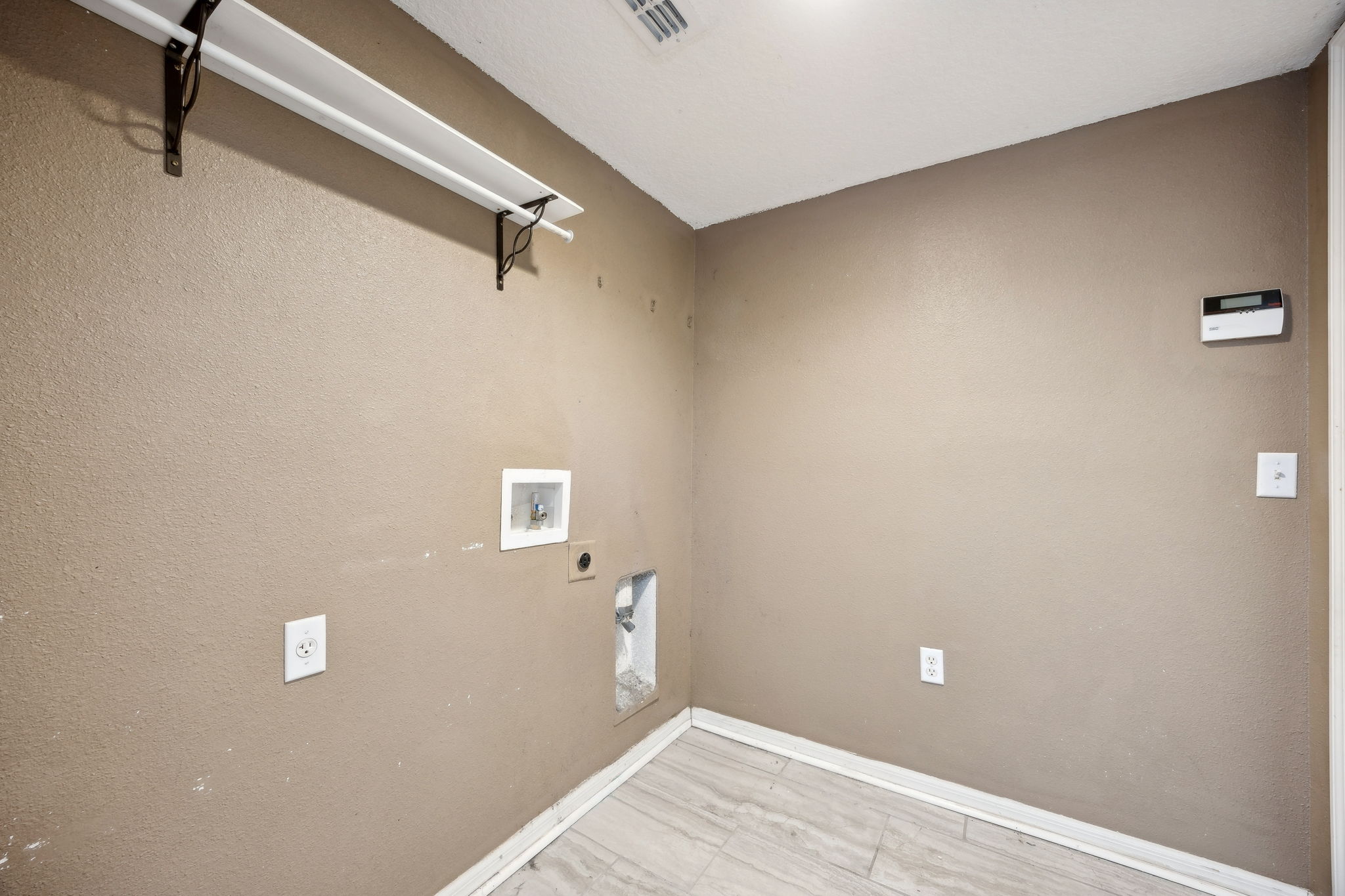 Laundry room on first level, off of garage.