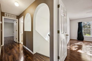 Flooring continues upstairs.