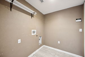 Laundry room on first level, off of garage.