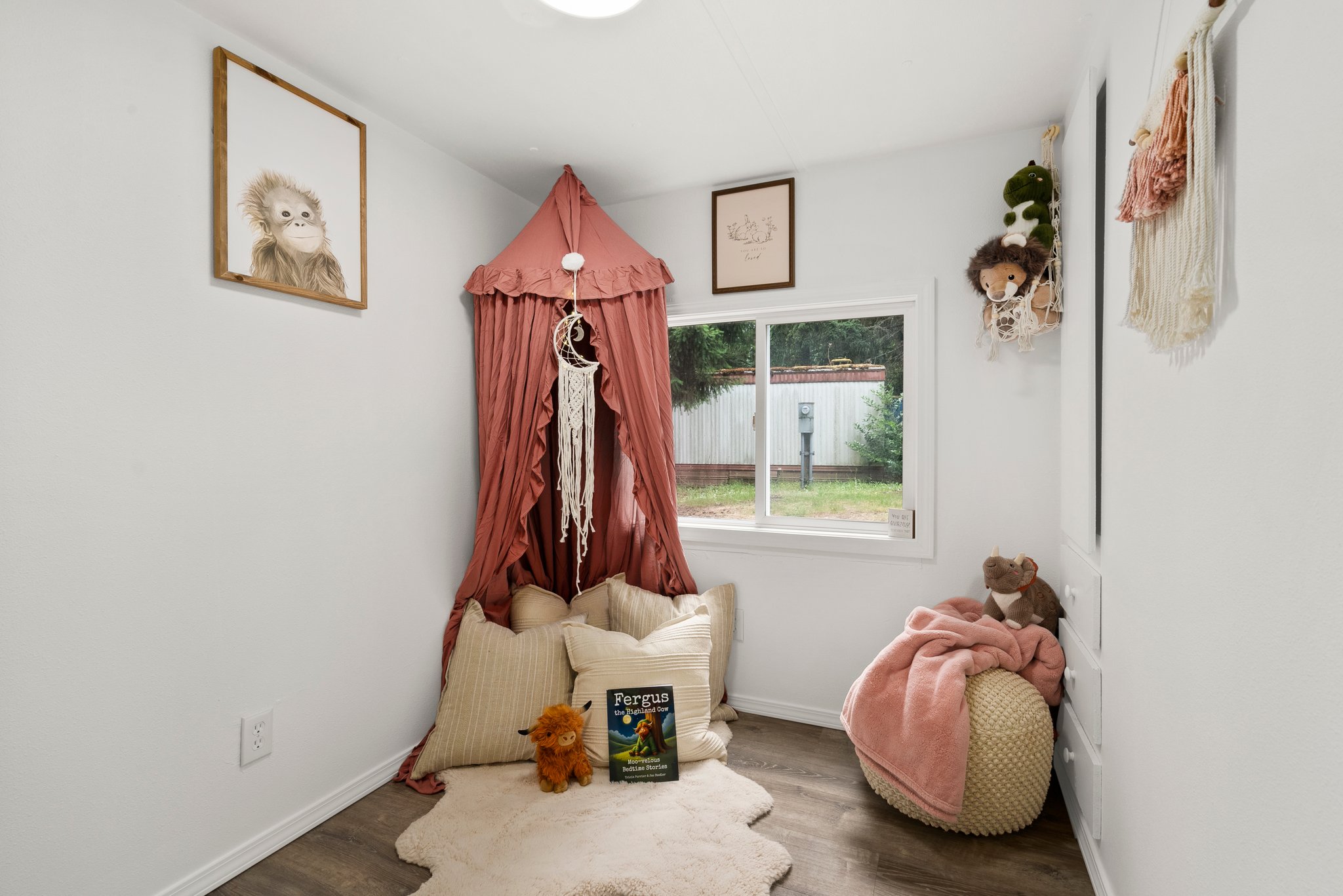 Second bedroom with charming built-in shelf storage and second closet.