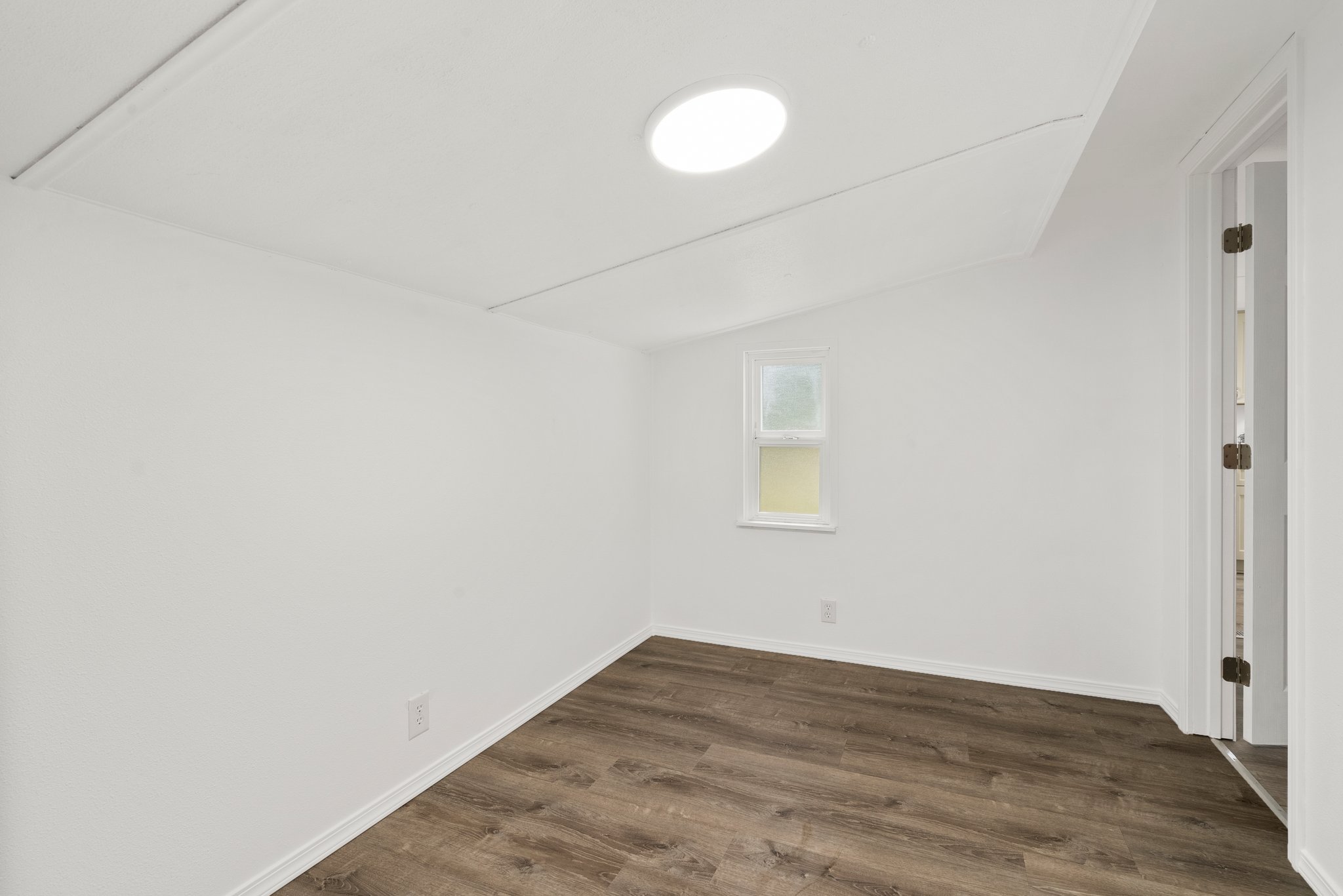 Bonus room off of living room for that extra space, office, storage, or playroom.