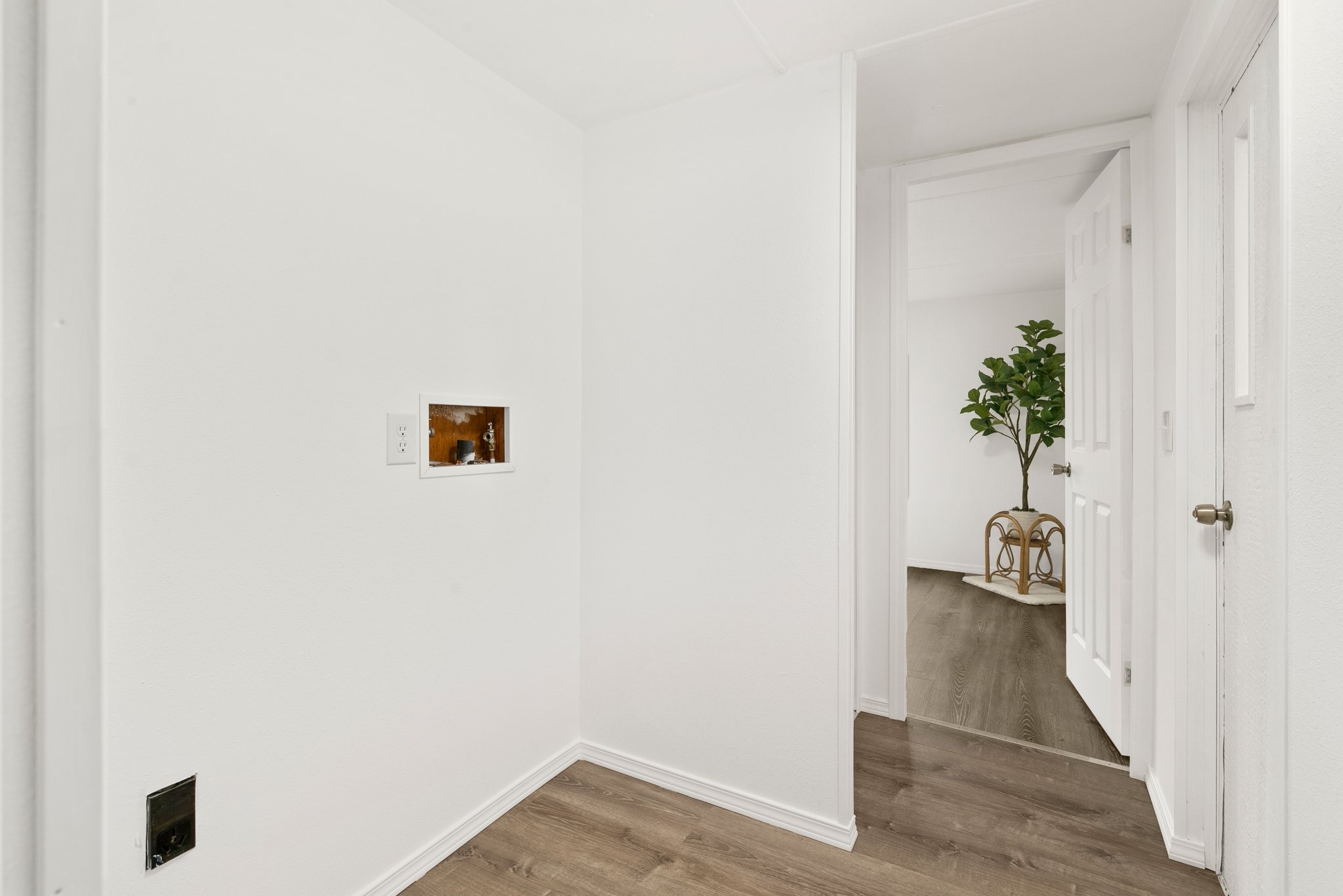 Laundry space in hallway.