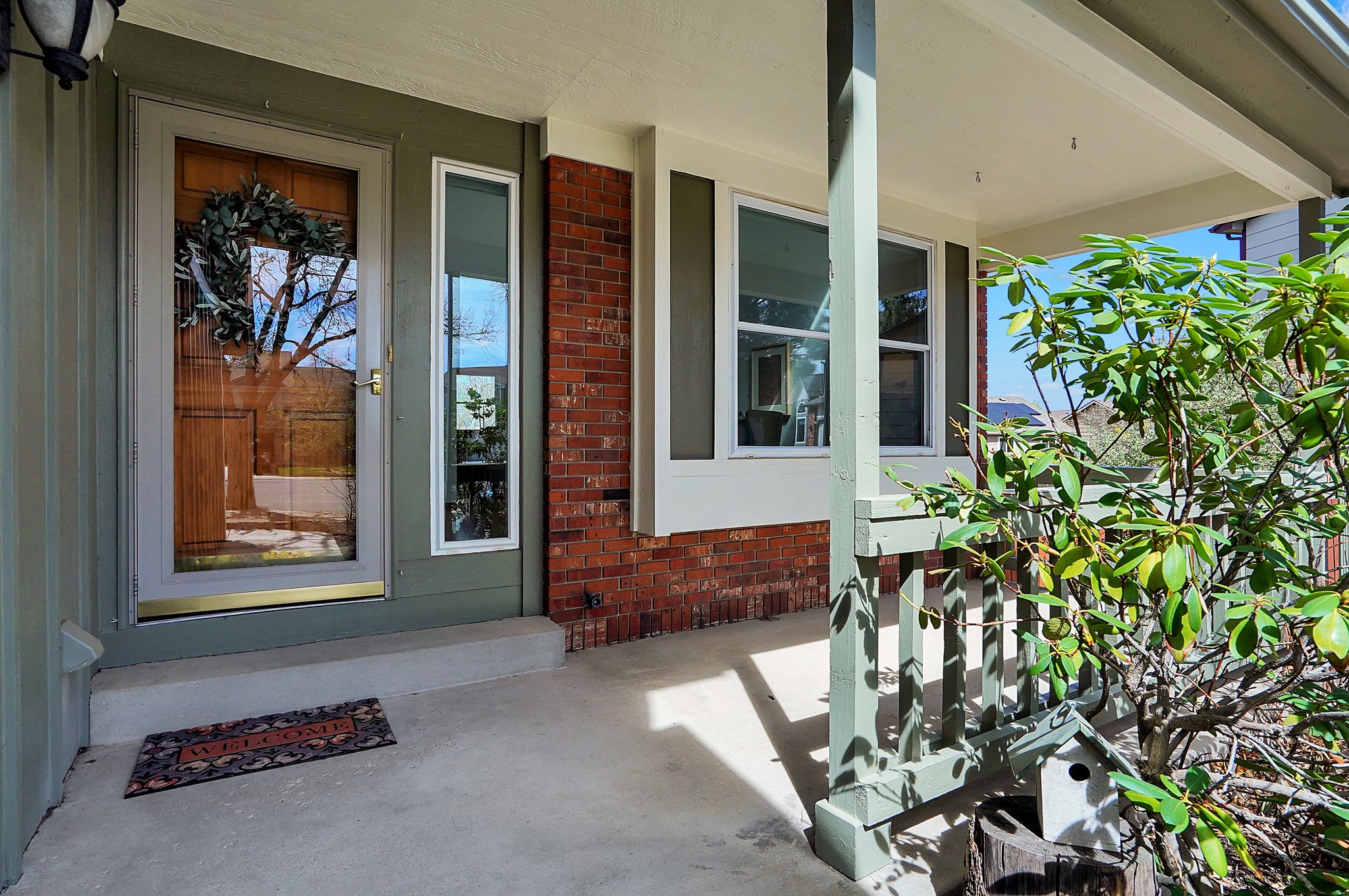 Spacious Covered Front Porch Overlooking Cul-De-Sac