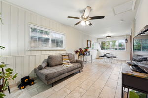 Sunroom has exposed brick on one wall