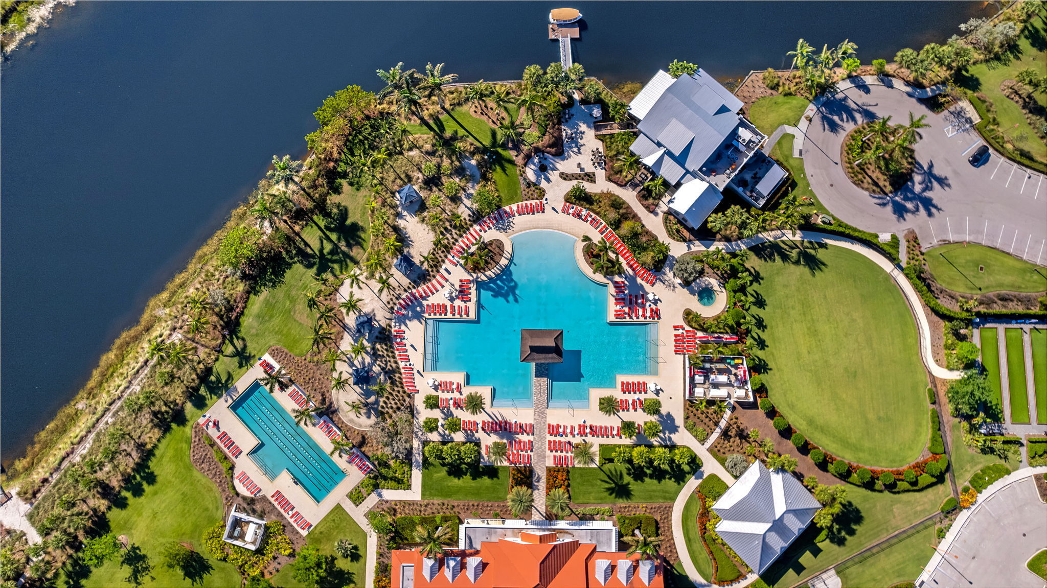 Isles Resort amenity center features style & lap pool, Overlook Bar & Grill