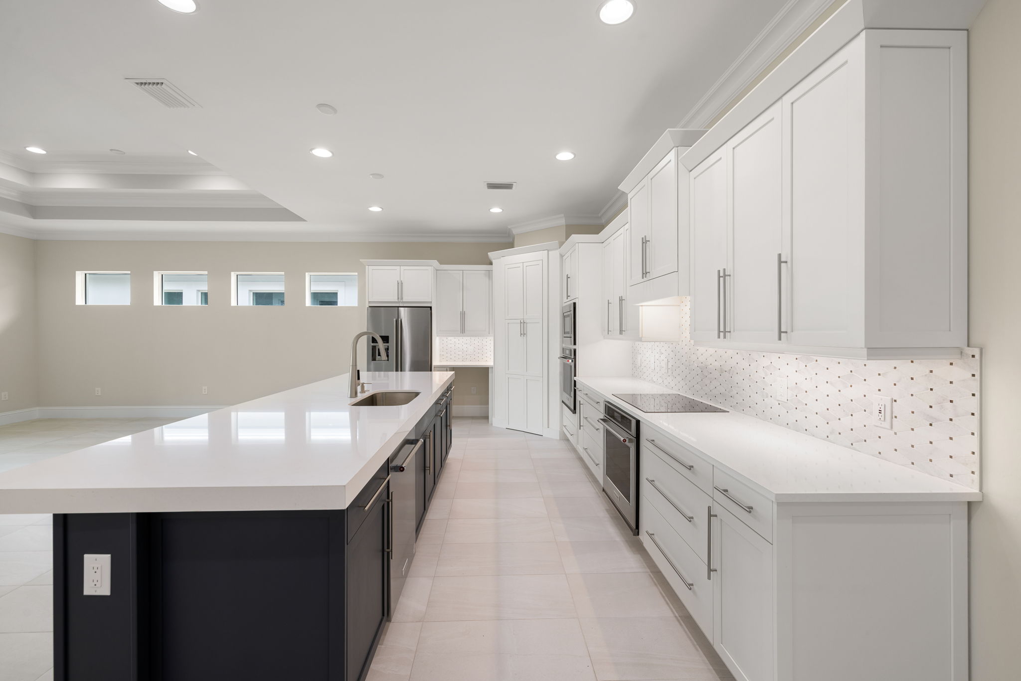 Bright, open kitchen with walk-in pantry