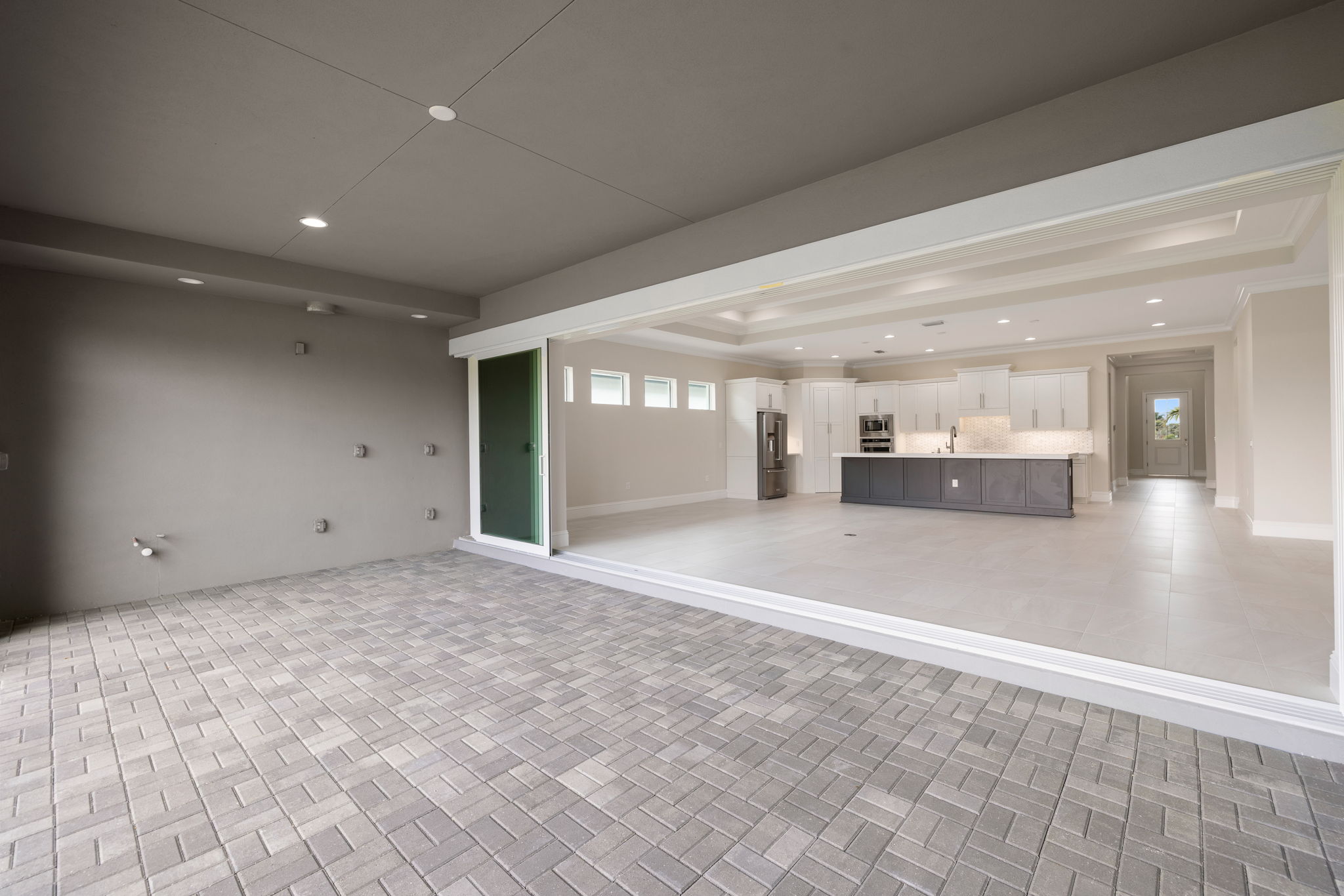 Spacious covered lanai, pre-wired and plumbed for custom outdoor kitchen