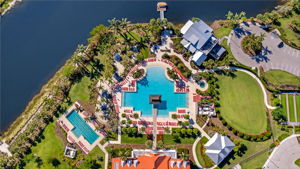 Isles Resort amenity center features style & lap pool, Overlook Bar & Grill