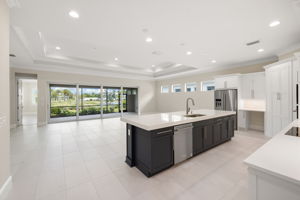 Bright, open kitchen, living & dining areas and lake views