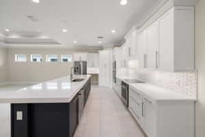 Bright, open kitchen with walk-in pantry