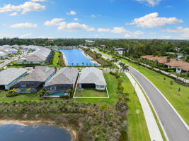 Premier corner lot featuring front and rear lake views