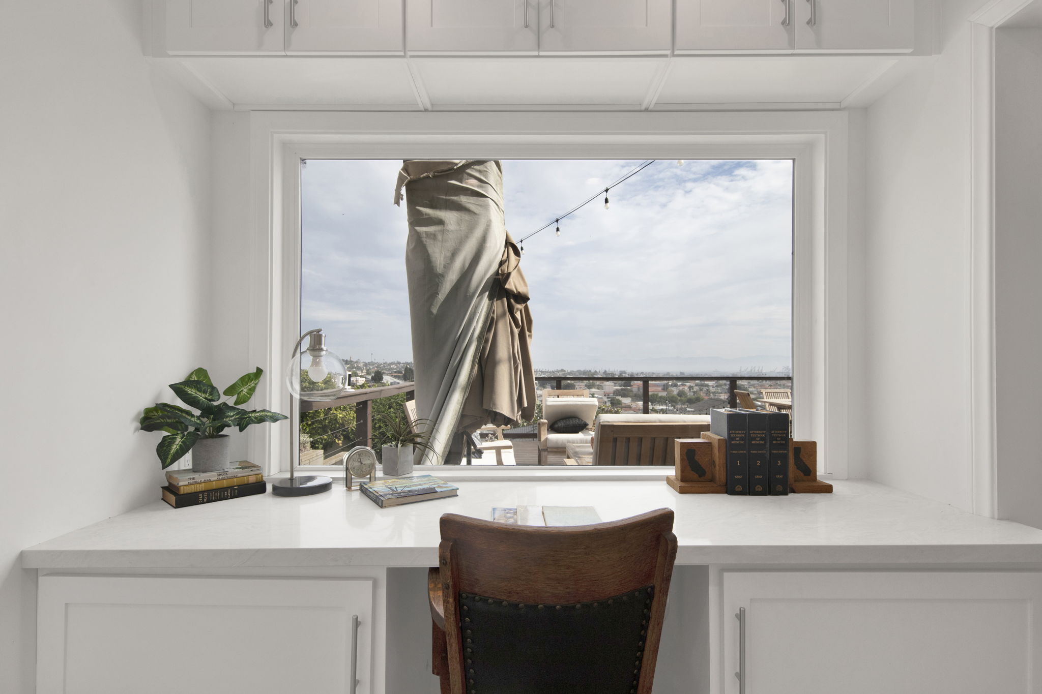 Harbor view from living area showing working cranes Port of Los Angeles