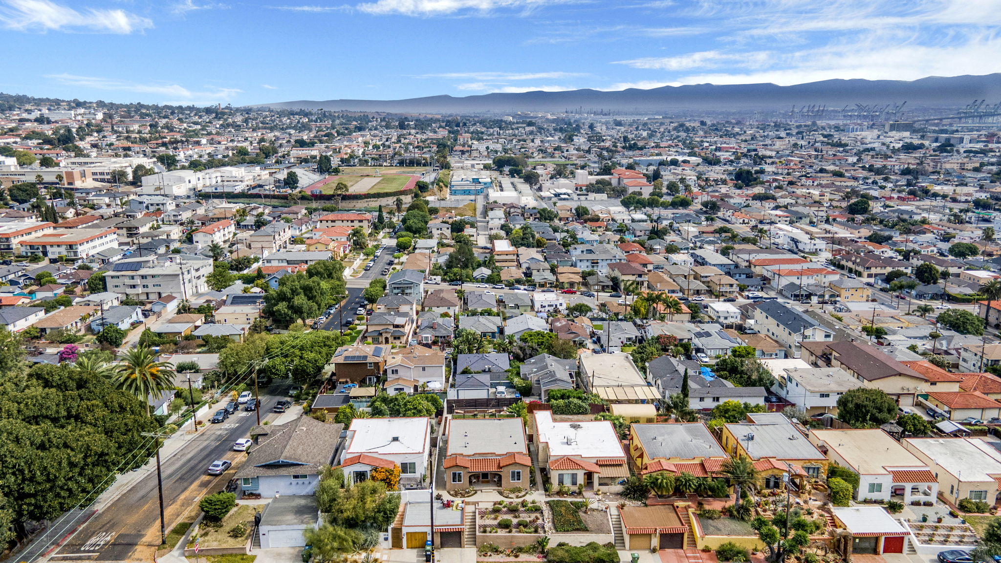 Back yard view of harbor cranes Port of LA from property San Pedro