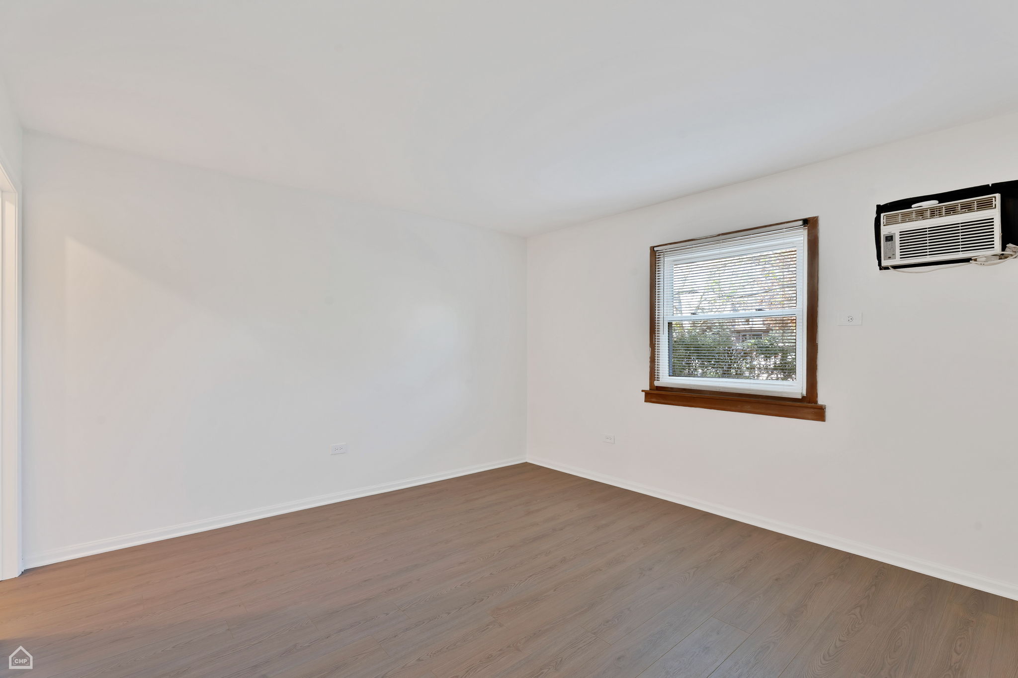 Large bedroom with wall AC
