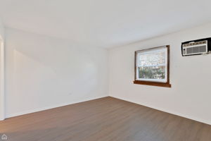 Large bedroom with wall AC