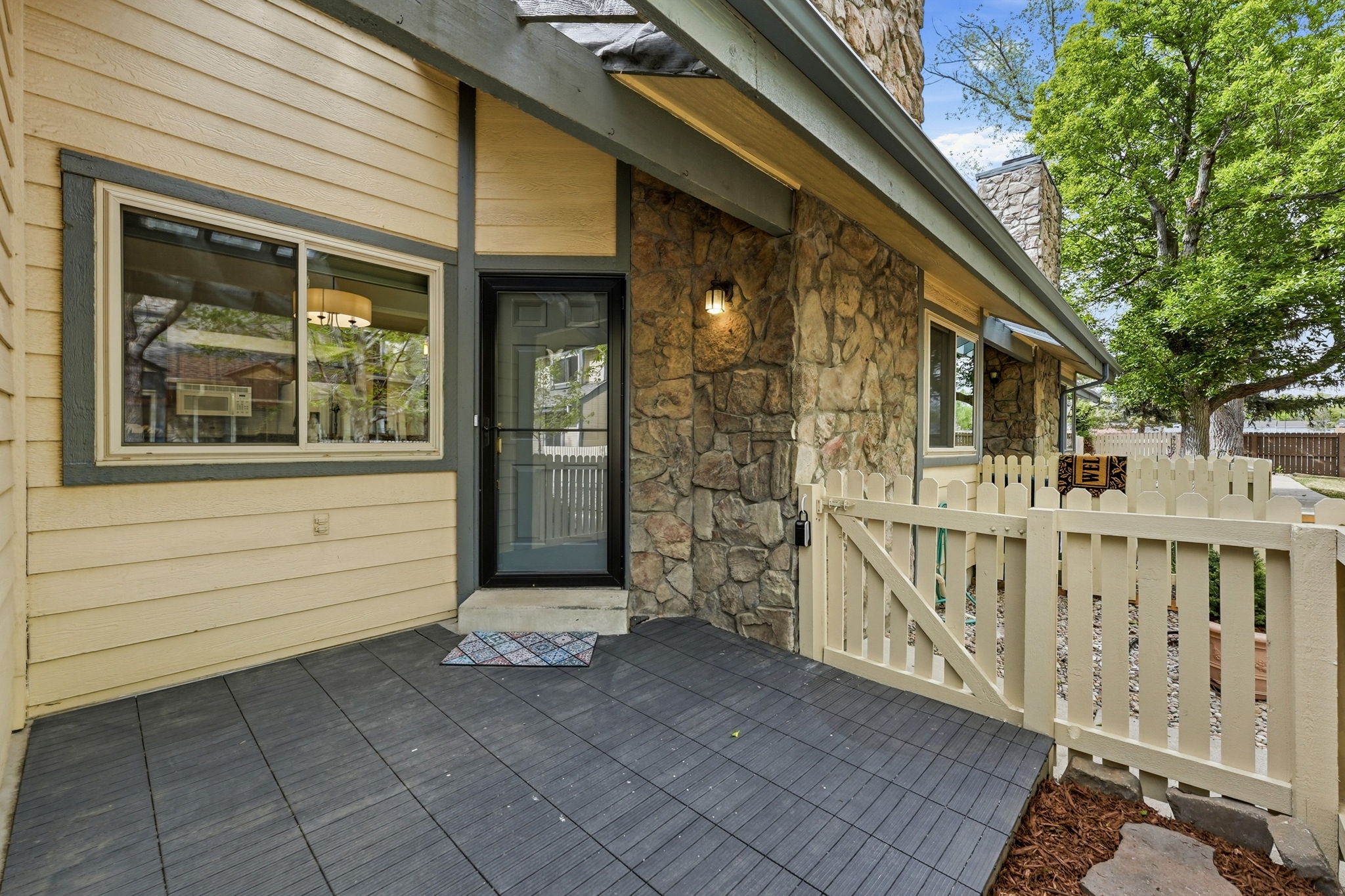 Fenced Patio (9'4"x10'3") at Main Entrance in Beautiful Courtyard