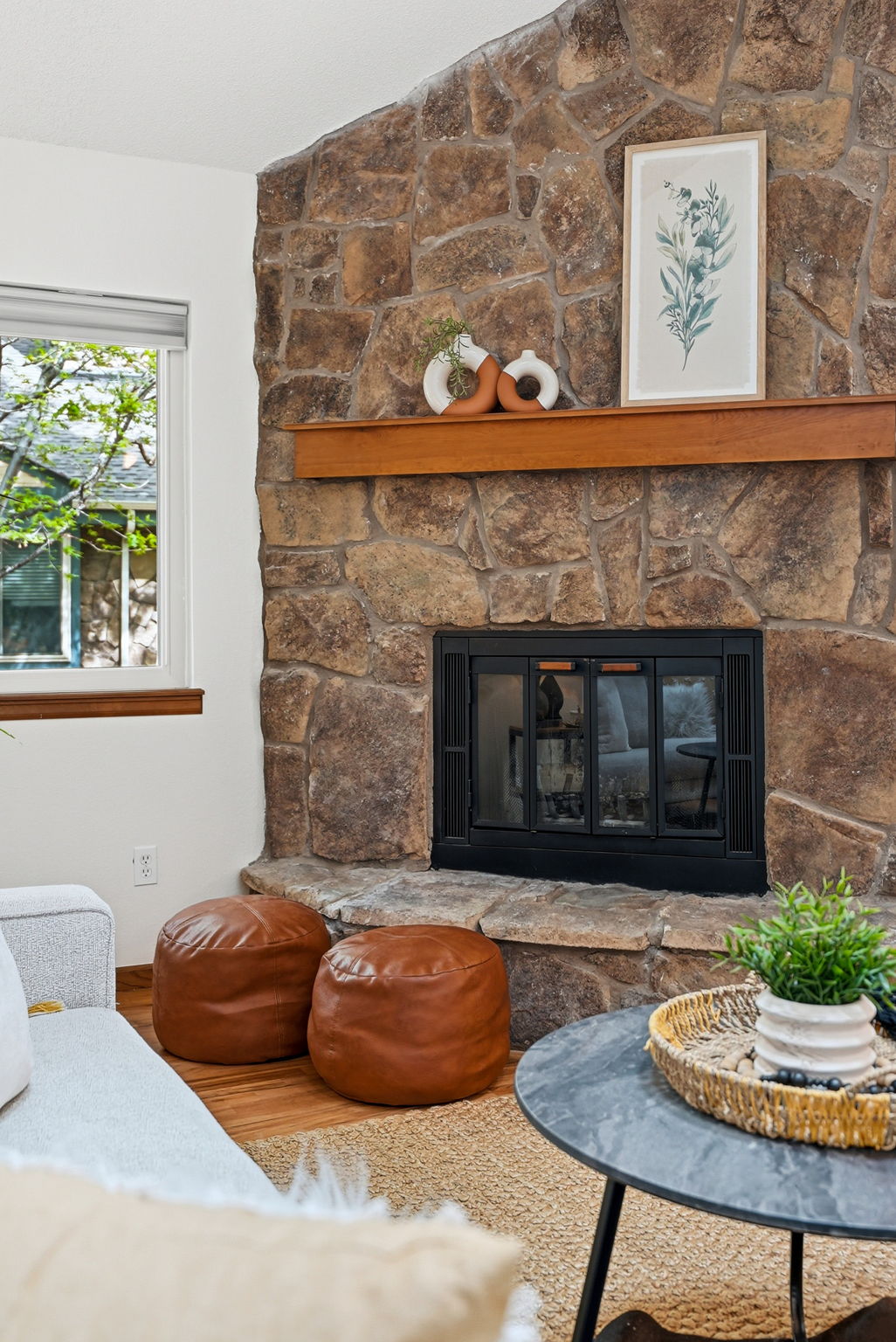 Living Room with Vaulted Ceilings, Exposed Beam, Wood-Burning Fireplace, Real Hardwood Floors, Wood-Burning Fireplace and New Paint Throughout