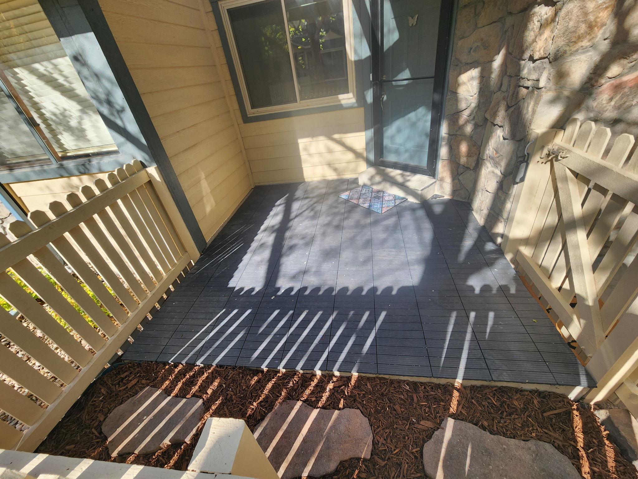 Fenced Patio (9'4"x10'3" - It's Larger than It Appears in This Photo) at Main Entrance in Beautiful Courtyard