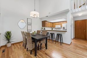 Dining Room with Real Hardwood Floors, Kitchen with Bar Seating  (All Kitchen Appliances Included) and New Paint Throughout