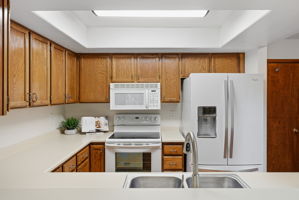 Kitchen with Bar Seating  (All Kitchen Appliances Included) and New Paint Throughout