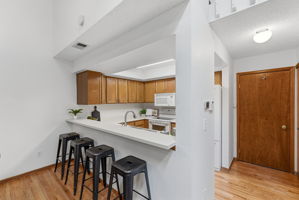 Kitchen with Bar Seating  (All Kitchen Appliances Included) and New Paint Throughout