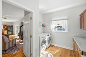 Laundry on Main Level with Cabinets and Folding Area