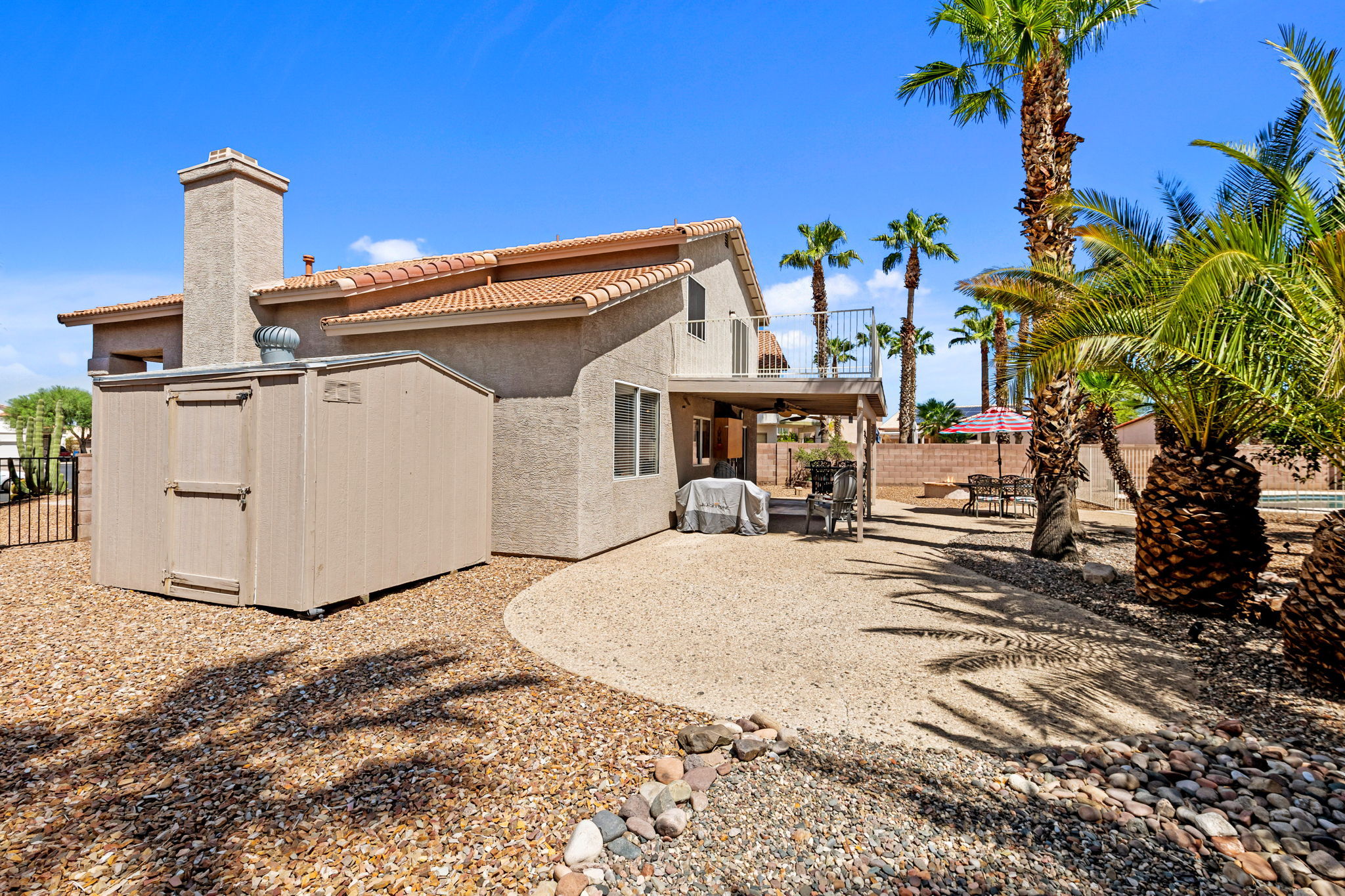 West side yard with large storage shed!